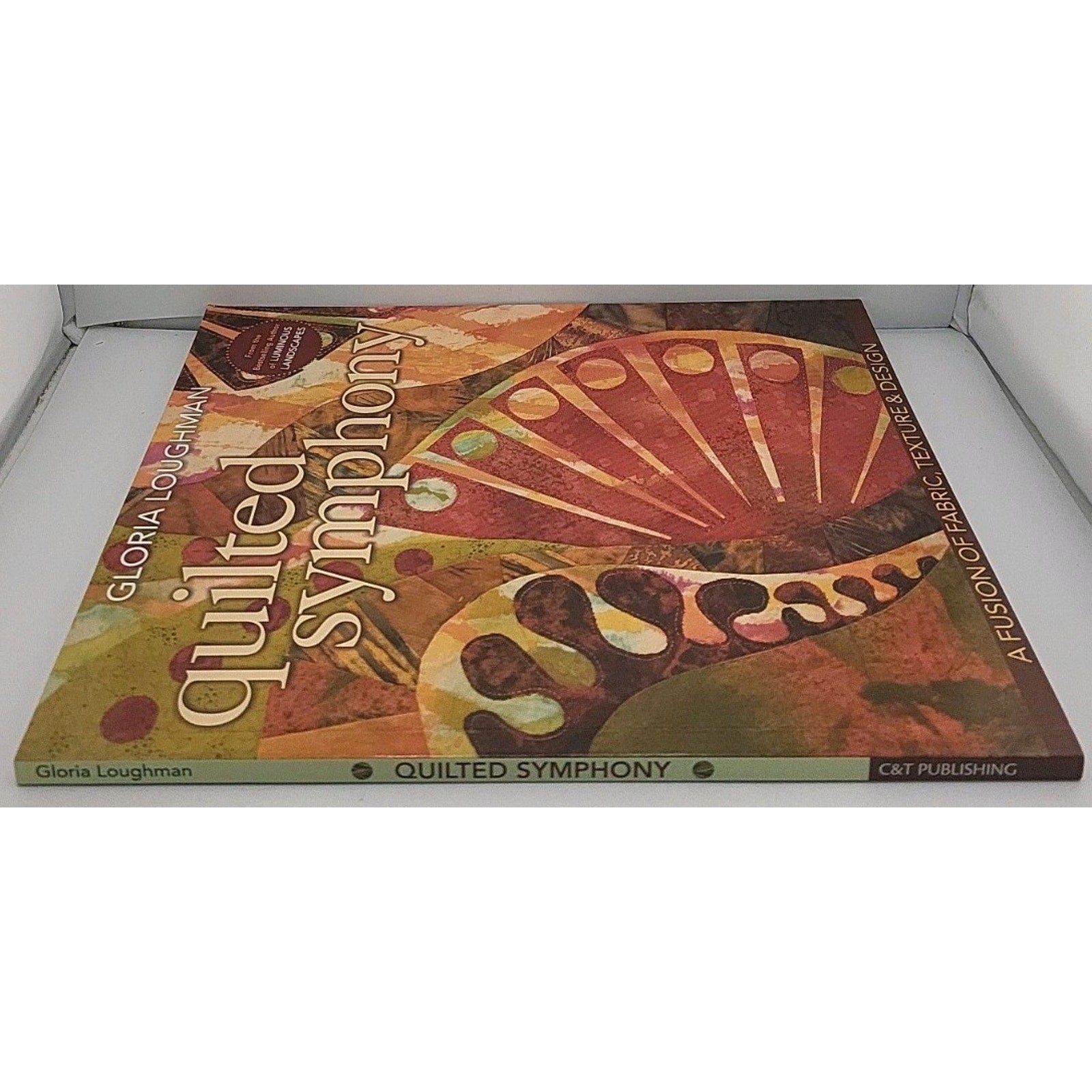 Quilted Symphony - a Fusion of Fabric, Texture and Design by Gloria Loughman...