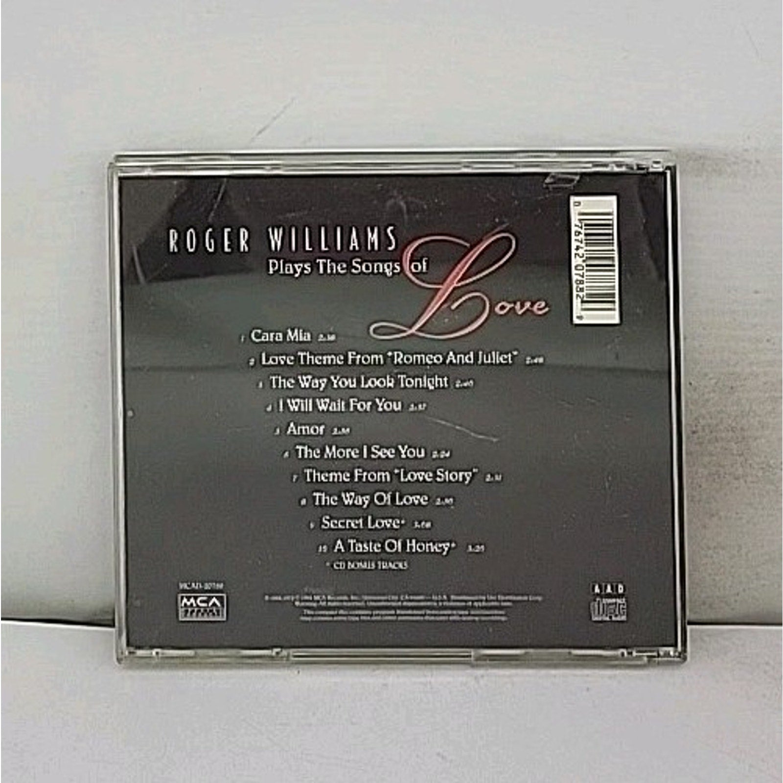 Plays the Songs of Love by Roger Williams (CD, 1995)