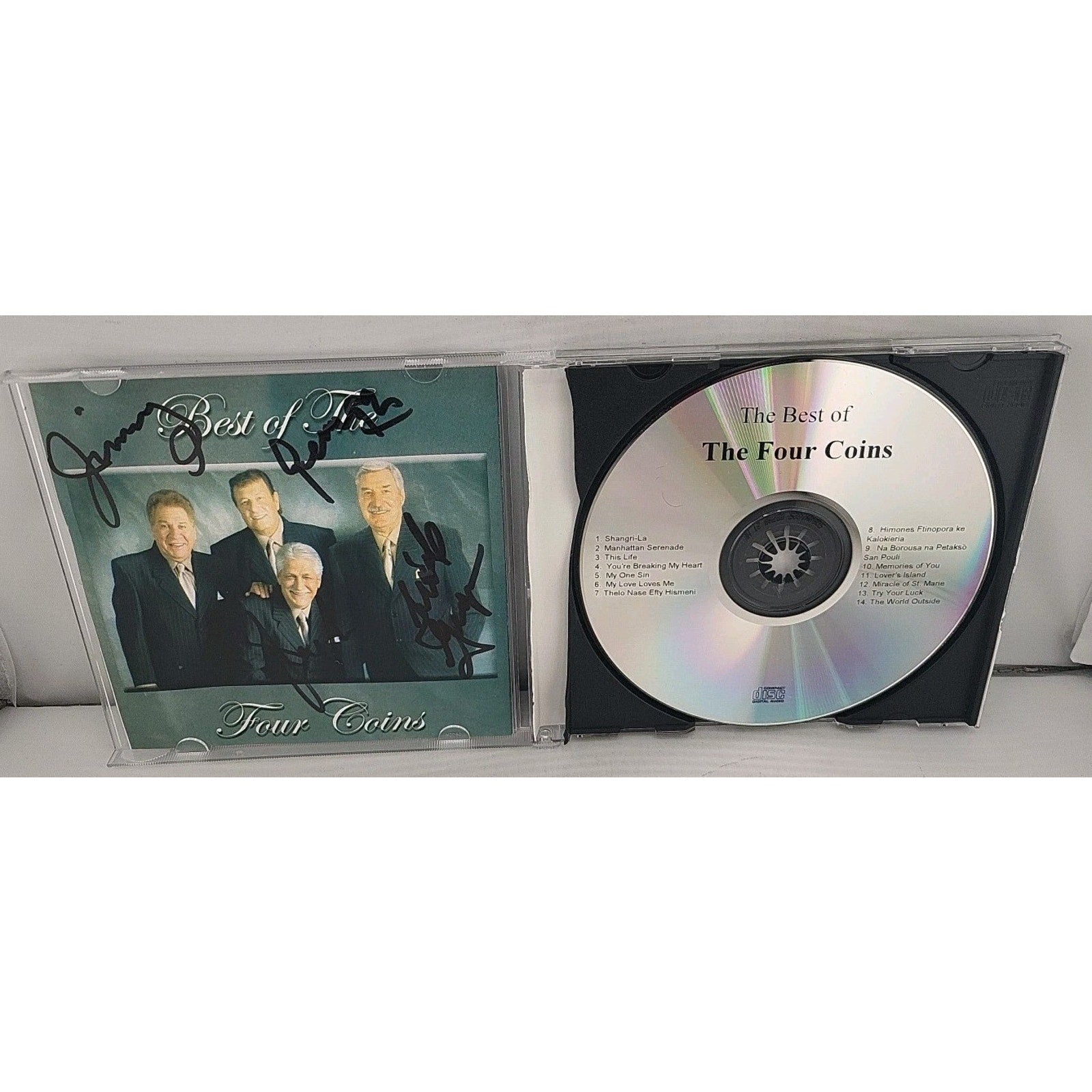 The Best Of The Four Coins CD Signed