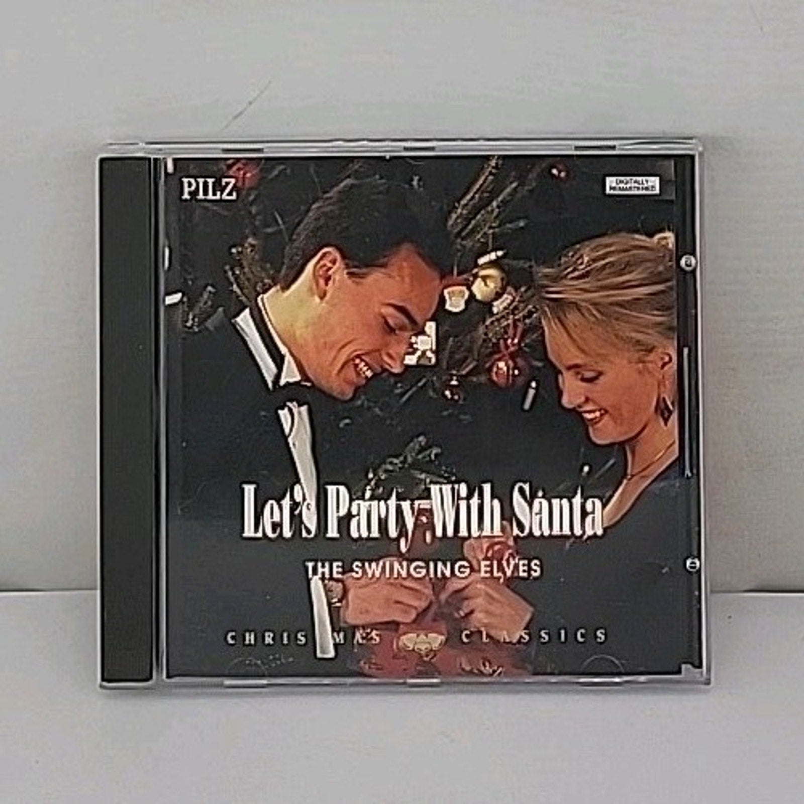 Let's Party With Santa By The Swinging Elves CD