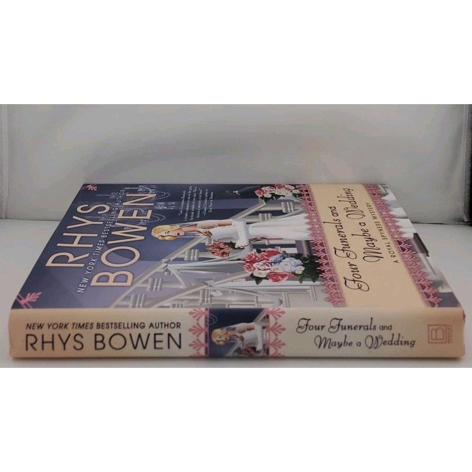 Four Funerals and Maybe a Wedding by Rhys Bowen Hardcover Book