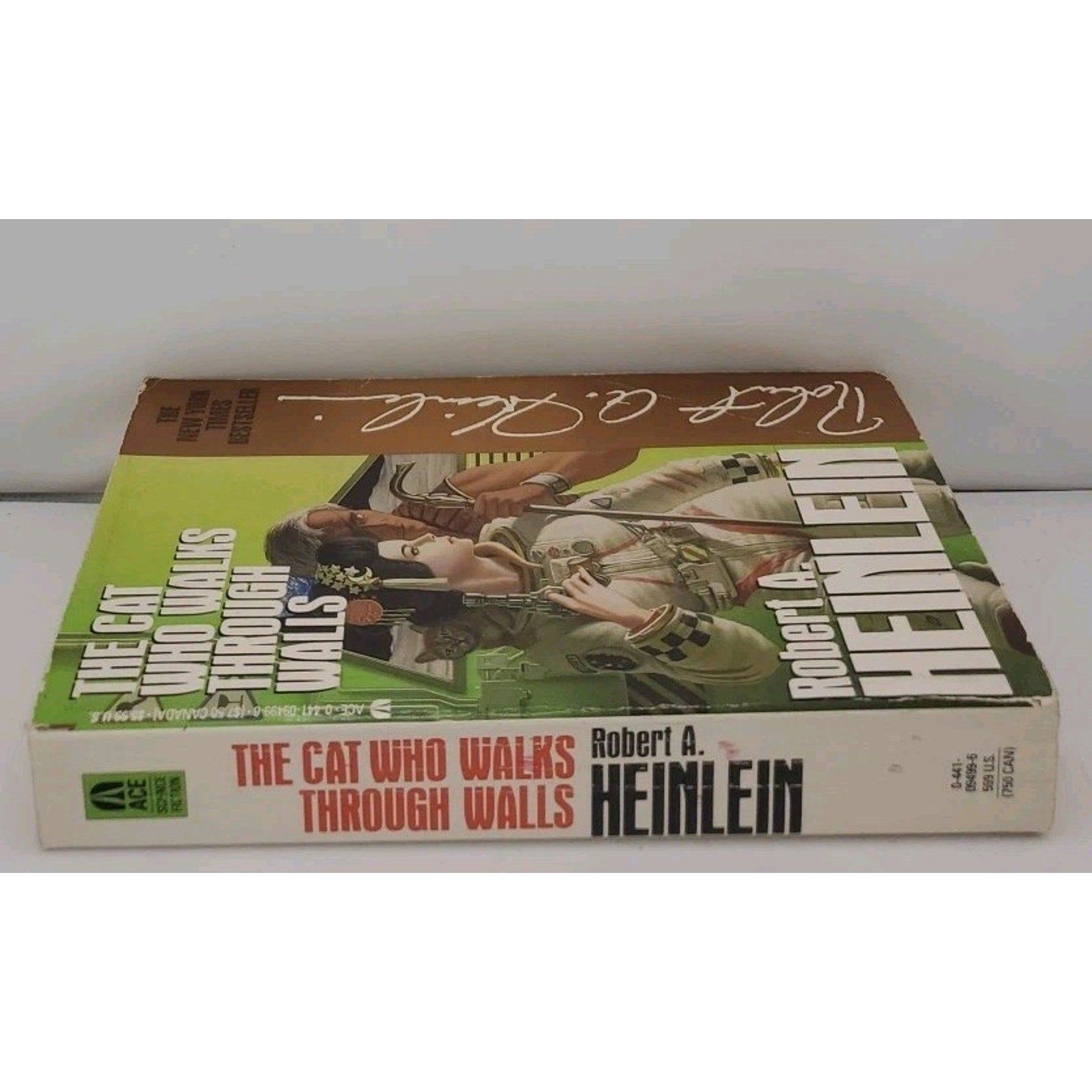 Cat Who Walks Through Walls by Robert A. Heinlein (1986, Trade Paperback)