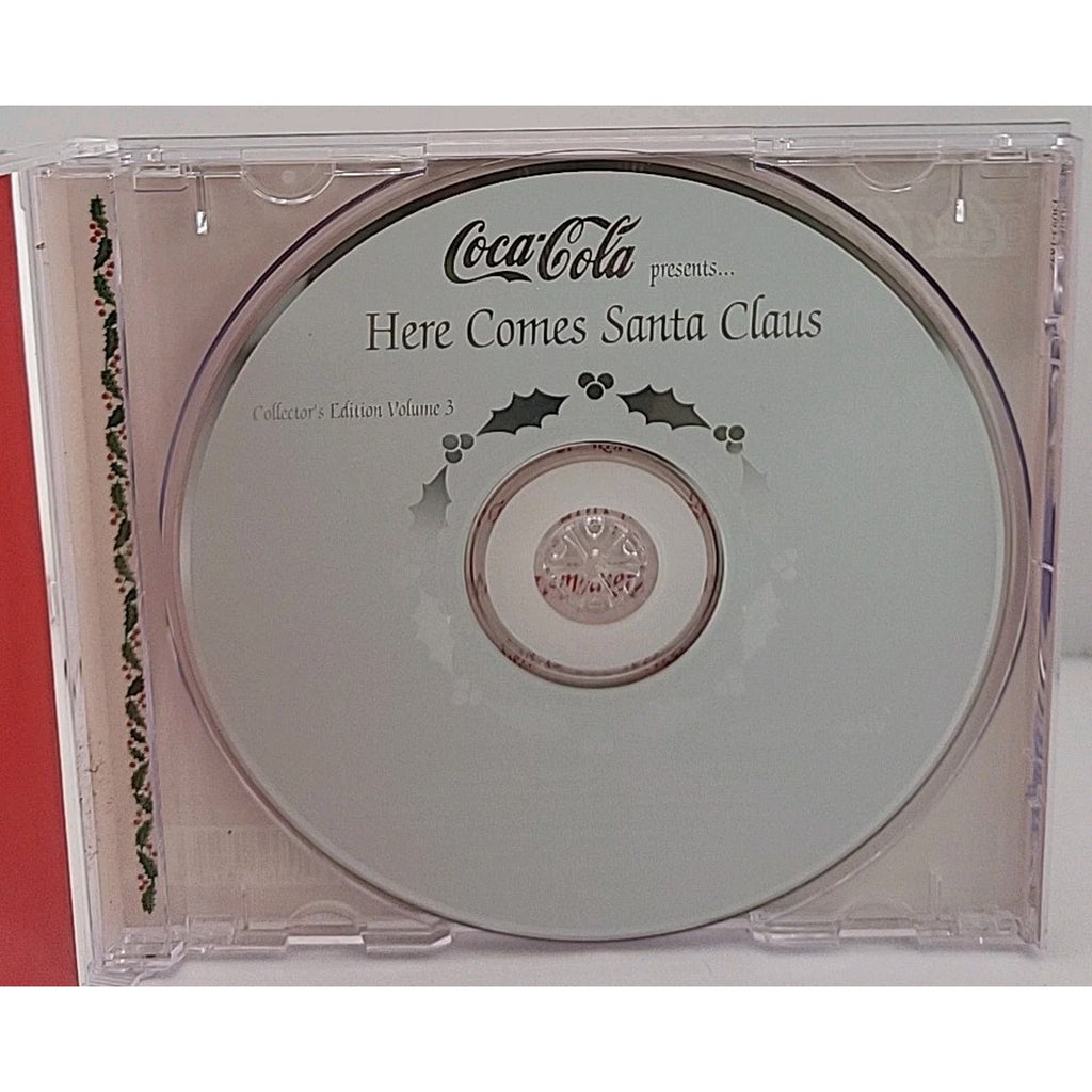 Here Comes Santa Claus: World's Favorite Christmas Carols CD / Coke a Cola