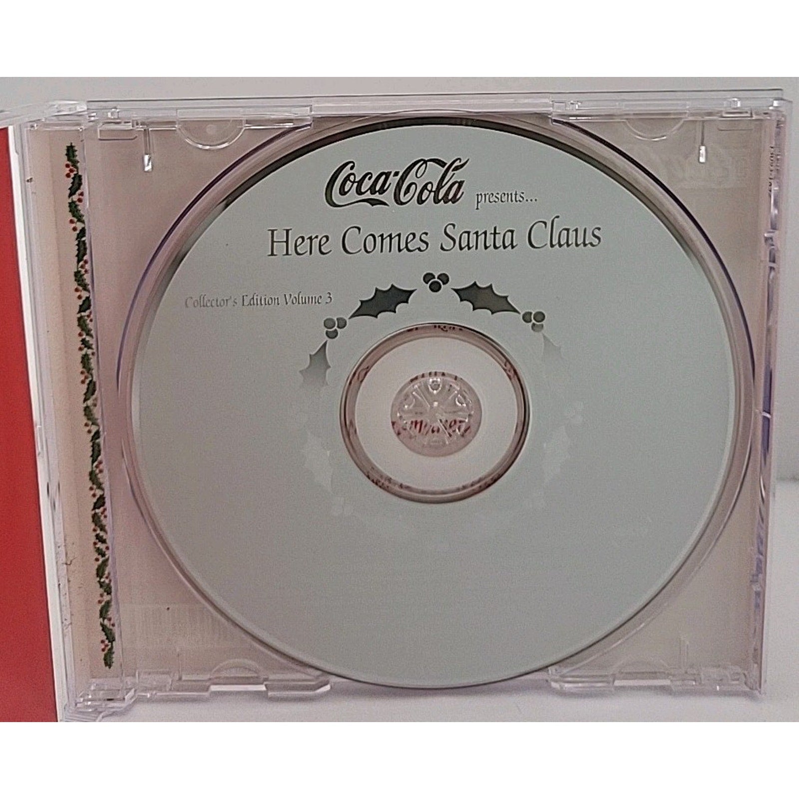 Here Comes Santa Claus: World's Favorite Christmas Carols CD / Coke a Cola