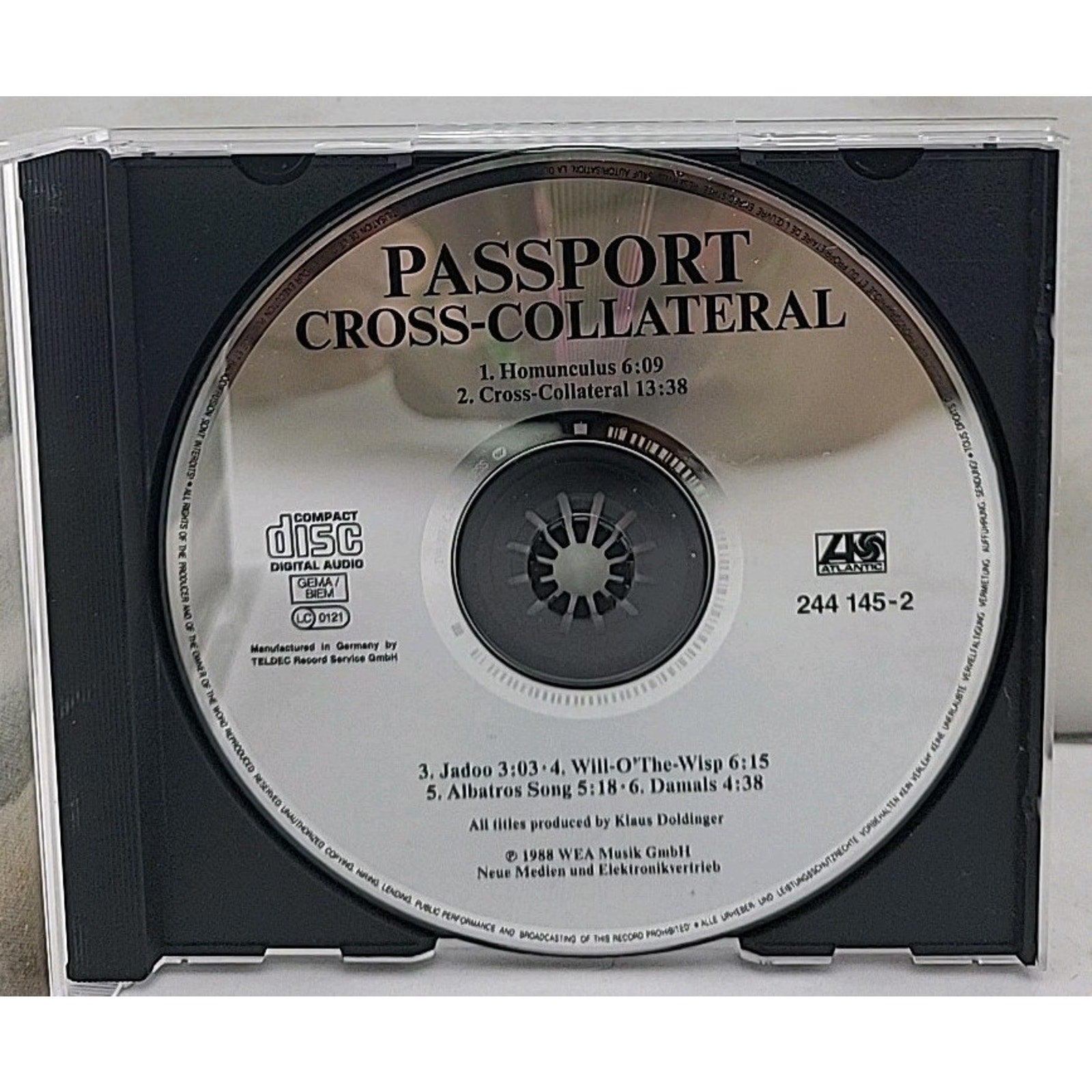 Cross Collateral by Passport (CD, 1998)