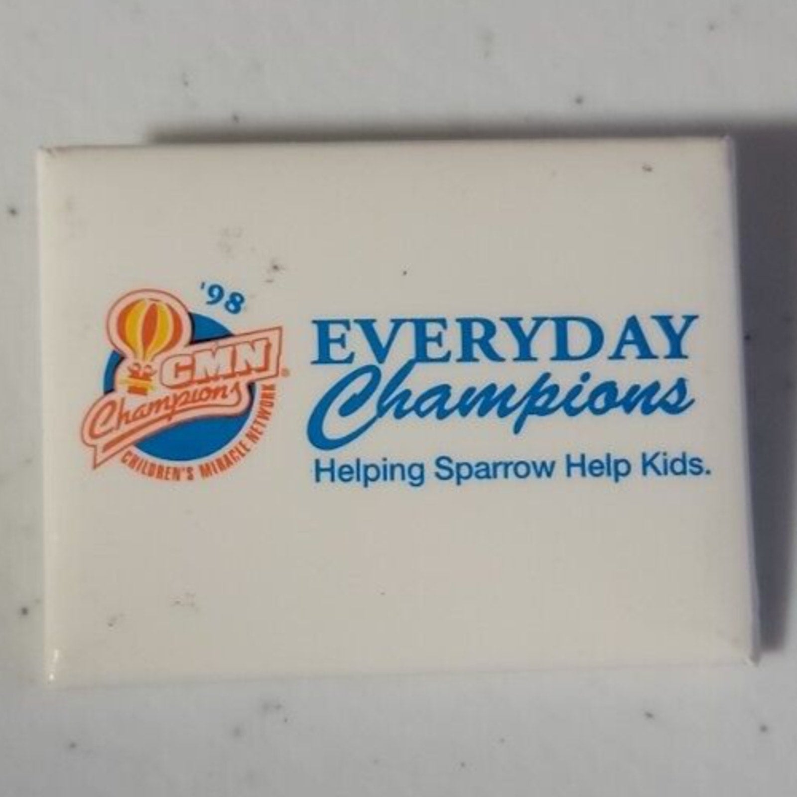 98 Cmn Champions Everday Champions Helping Soarrow Help Kids Button