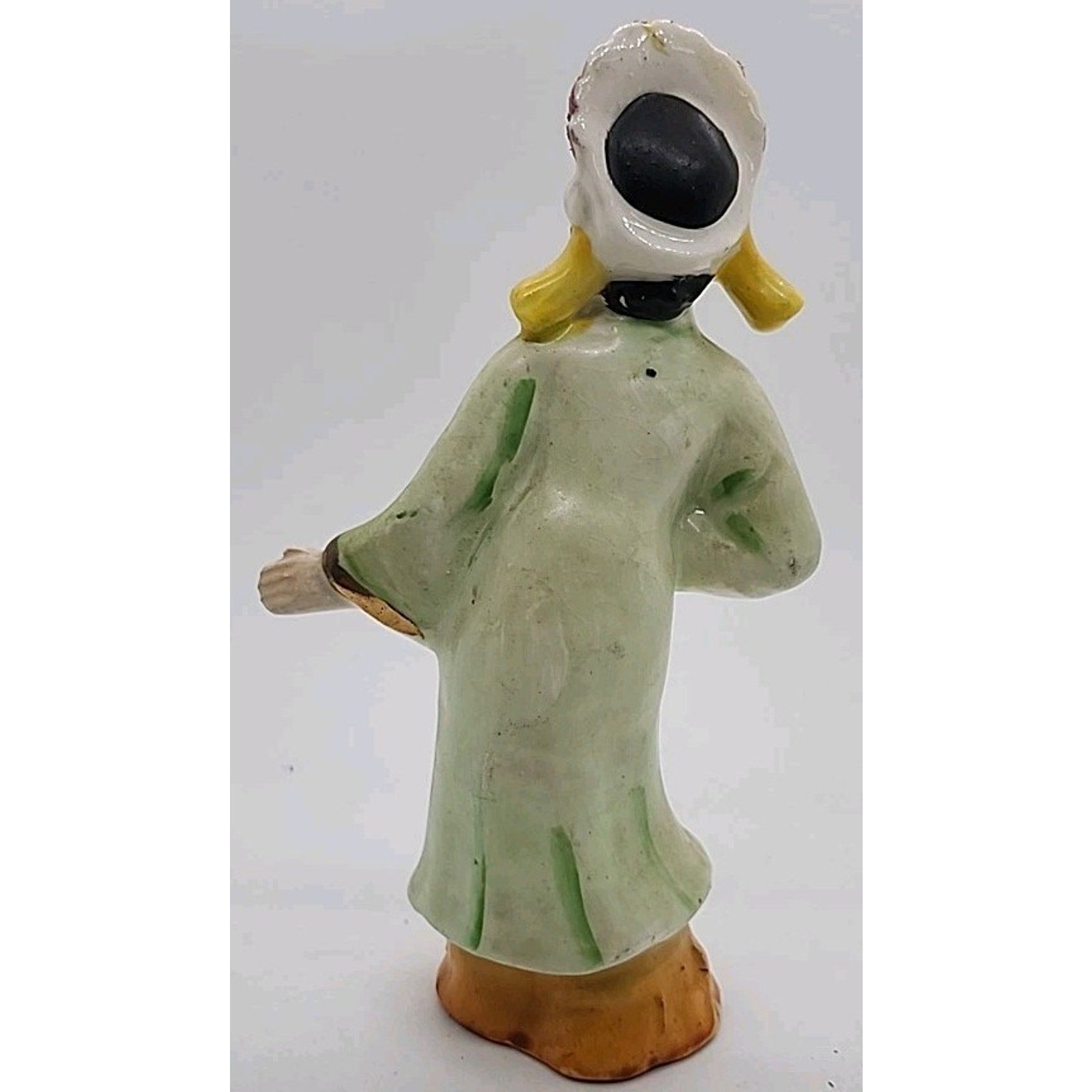 Asian Woman in Green/Orange Dress Porcelain Figurine