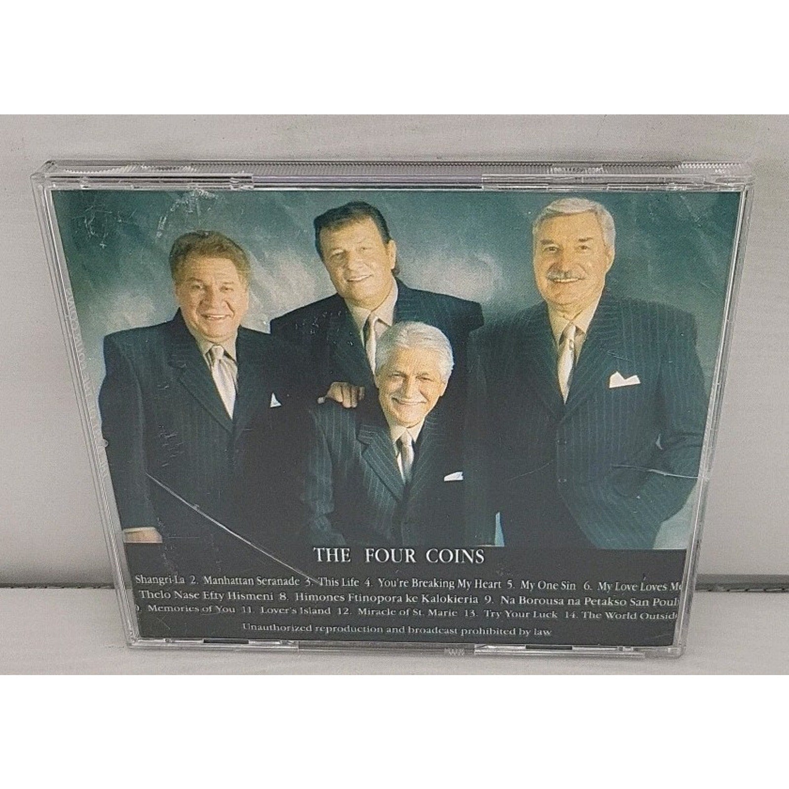 The Best Of The Four Coins CD Signed
