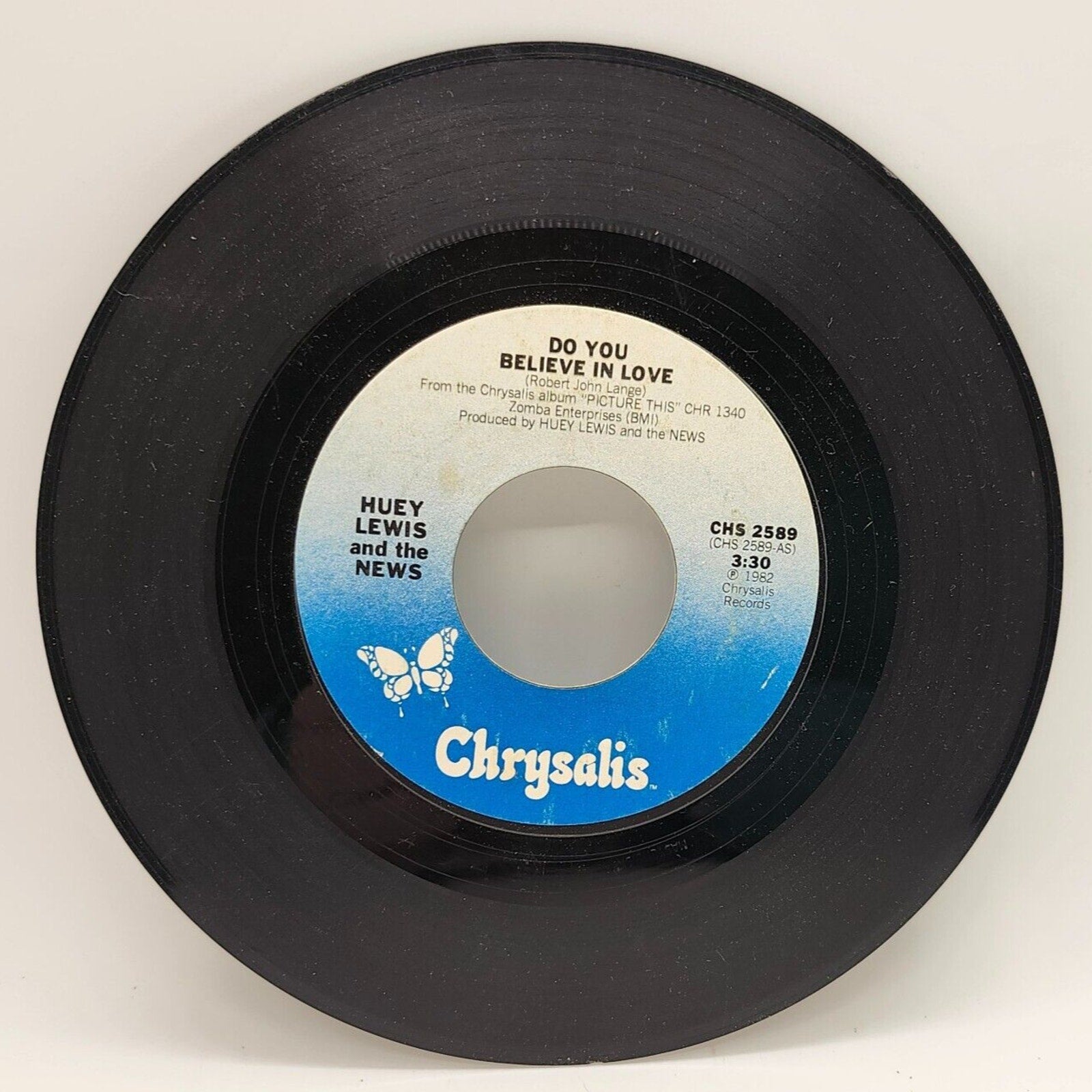 Do You Believe In Love / Is It Me By Huey Lewis (Record) - CHS 2589