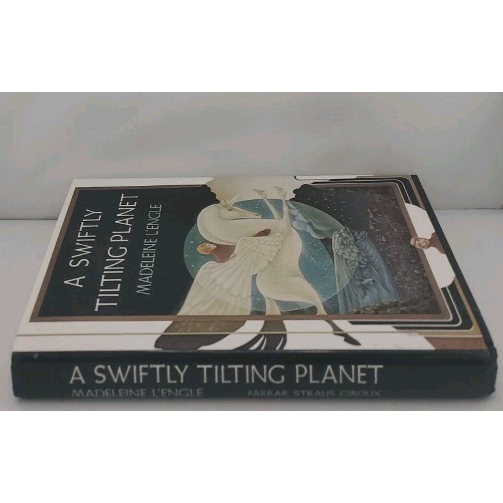 Swiftly Tilting Planet : (National Book Award Winner) by Madeleine L'Engle...